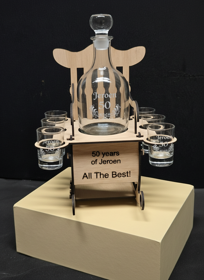 Bottle holder with matching glass engravings